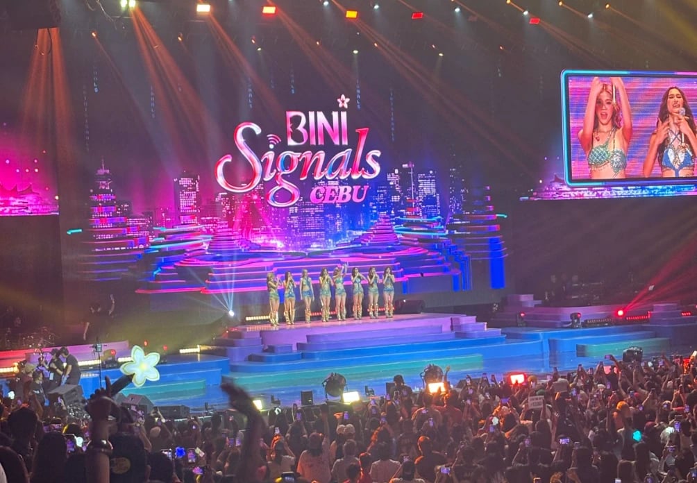 BINI performing on stage at the concert Full Scale employees won tickets to