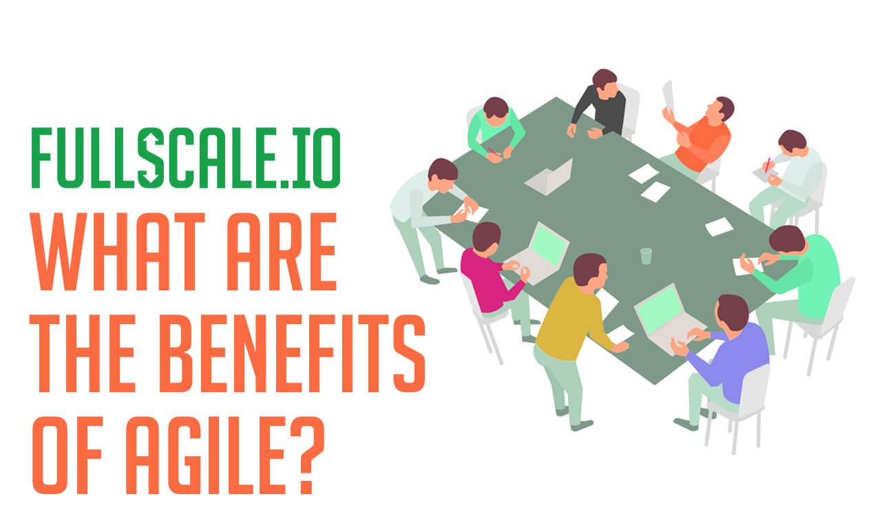 People sitting around a table doing agile development.